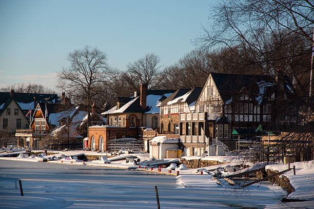 Snowed  covered Boathouse and Frozen Schuylkill River, Philadelphia Afther the blizard stormof winter 2016, frozen Schuylkill River and snowed Boathouse during sunset philadelphia winter stock pictures, royalty-free photos & images