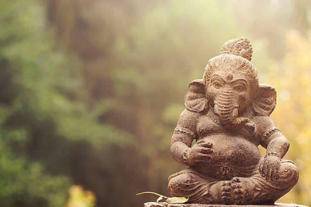 ganesha deity outdoors garden decoration, ganesha deity stone statue ganesh stock pictures, royalty-free photos & images