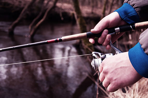 istock Fishing with rod on the river 577641072