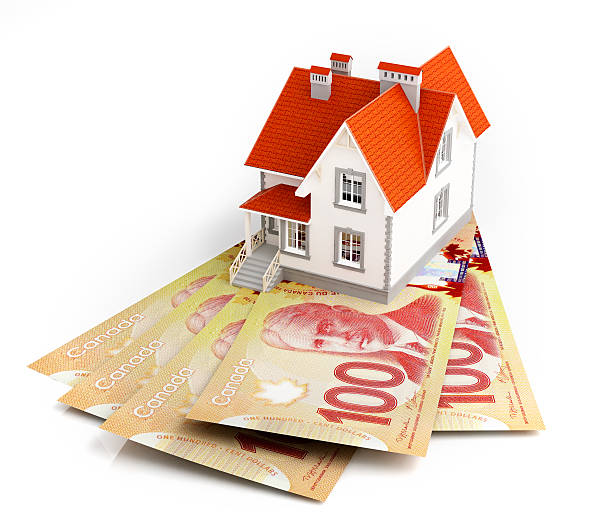 Canadian dollar banknotes under house Canadian dollar  banknotes under house, Mortgage concept. 3d rendered illustration. canadian currency photos stock pictures, royalty-free photos & images