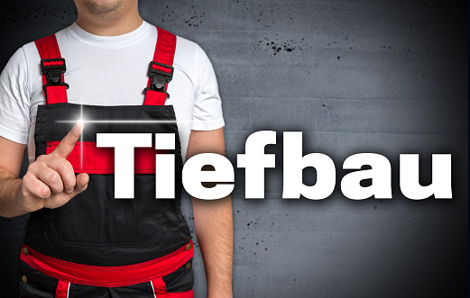 Tiefbau (in german civil engineering) touchscreen is shown by the craftsman.