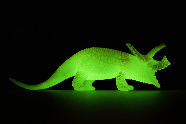 Close-up of glowing dinosaur.
