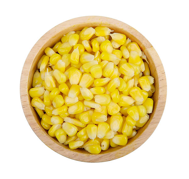 istock Sweet corn in wooden bowl on white background. 577651258