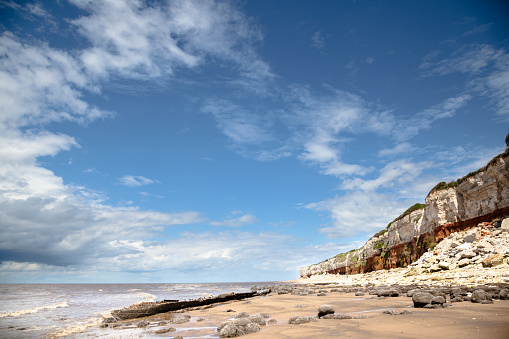 cliff erosion and shipwreck at Hunstanton Eastern England in summer