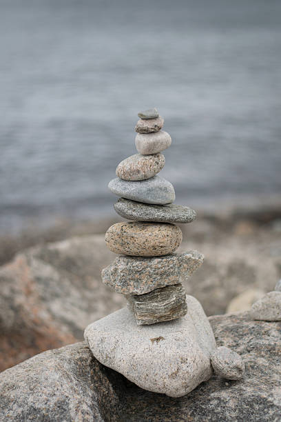 istock cairn on the Rhode Island shoreline 577652862