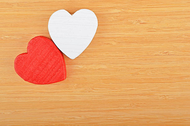 istock Heart on wooden background 577654140