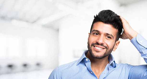 Man proud of his hair. Large copy-space stock photo