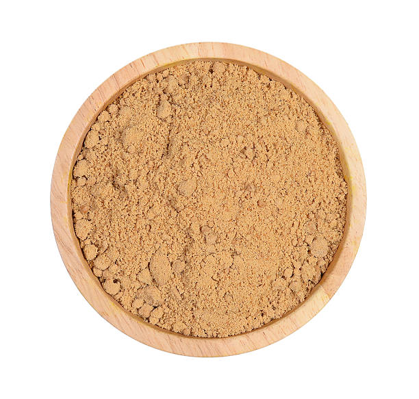 istock Top view brown sugar in wood bowl on white background. 577655748