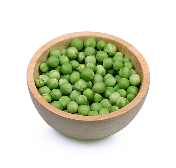 istock turkey berry in wood bowl isolated in white background 577657958