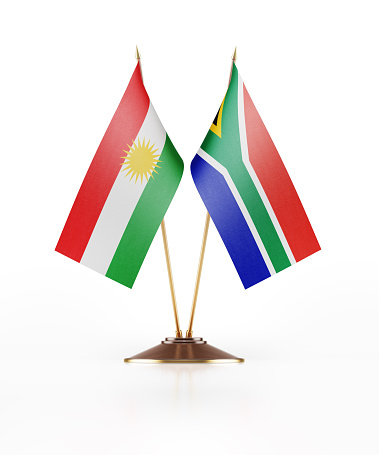 Miniature Flag of Kurdistan and South Africa. Desk piece flag pair. The flag has nicely detailed fabric texture.  Isolated on white background. Clipping path is included.