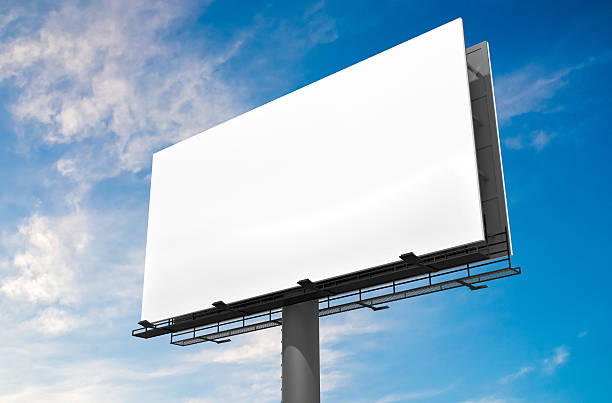 istock 3D illustration of blank white billboard against blue sky. 577658442