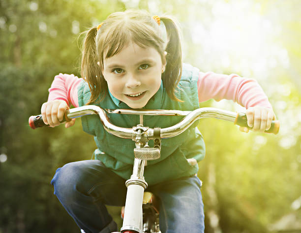 istock Child on bike driving closeup. 577659392