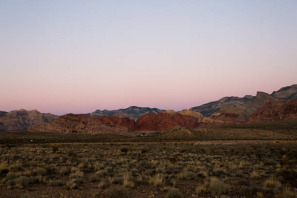 istock Red Canyon Mountains on Purple Sunset 577660262