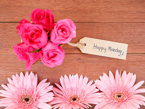 istock Handwriting Happy Monday on brown label paper 1 577660328