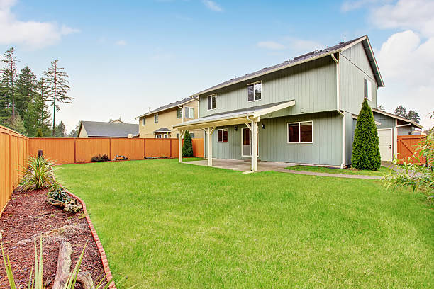 istock Covered backyard patio with concrete floor. 577660530