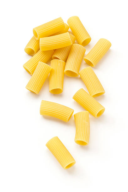 Pasta-Rigatoni - Wikipedia Rigatoni pasta isolated on white background. DSRL studio photo taken with Canon EOS 5D Mk II and Canon EF 100mm f/2.8L Macro IS USM rigatoni stock pictures, royalty-free photos & images