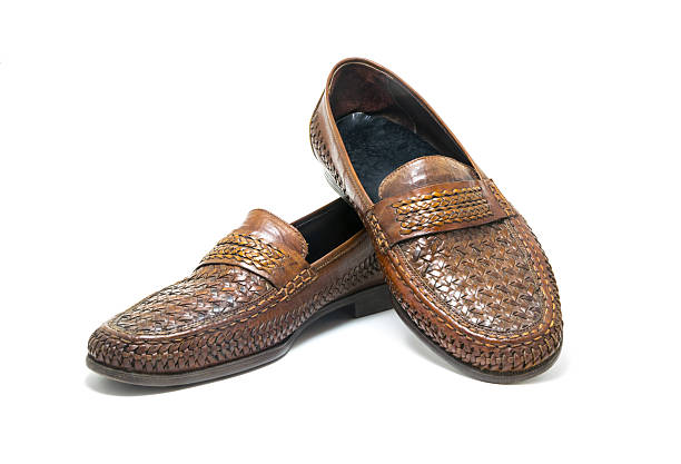 istock Brown, handmade leather shoes isolated on white background. 577936192