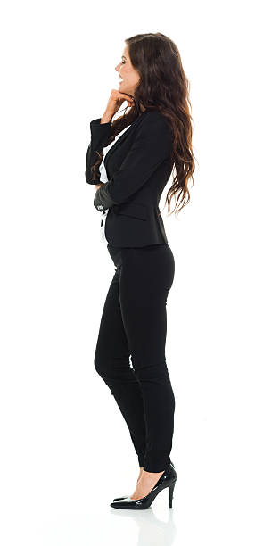 istock Smiling businesswoman standing 577936412