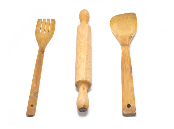 istock wooden cutlery isolated on white background. 577936942