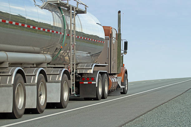istock Semi Tanker Truck On Interstate Highway, Side View, Closeup 577937070