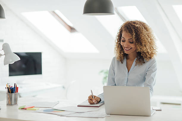 istock Latina Businesswoman Working In Her Office 577940616