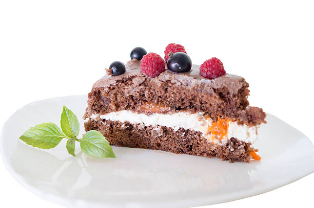 istock chocolate cake with fresh berries and mint 577940654