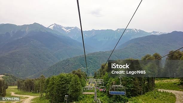 Descent On A Ropeway Stock Photo - Download Image Now - Blue, Equipment, Grass