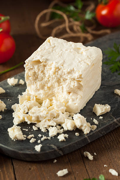 Raw Organic White Feta Cheese Raw Organic White Feta Cheese for Crumbling feta cheese block stock pictures, royalty-free photos & images