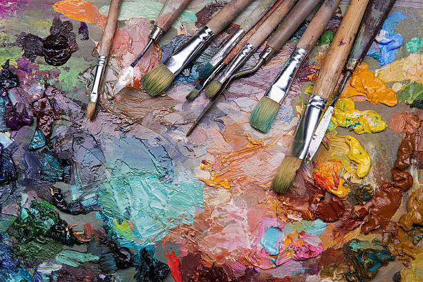 istock palette with paintbrush and palette-knife 577949822