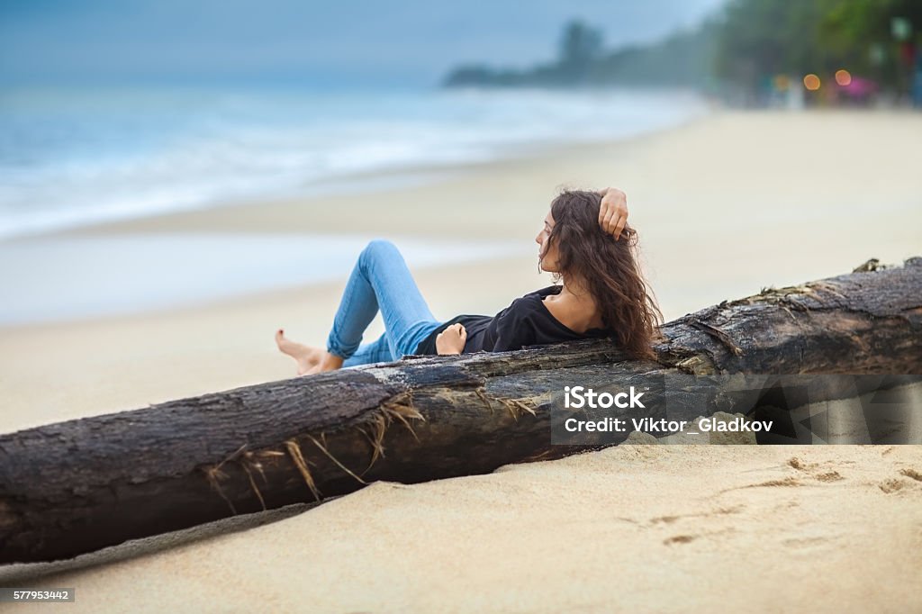 beautiful woman relax on the beach beautiful woman relax on the beach. vacation concept Adult Stock Photo