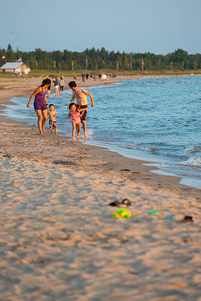 istock Mixed race family at the beach 577953670