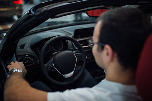 istock Man in convertible car 577955884