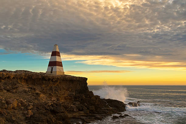 istock Obelisk, historic landmark at Cape Dombey during sunset, Robe, Australia 577959732