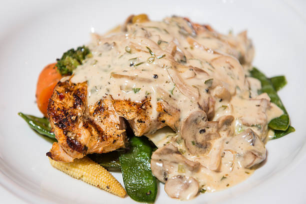 istock Grilled chicken breast with creamy mushroom sauce 577962362