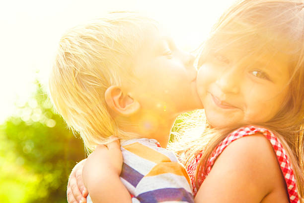 istock Shildren kissing 577964820