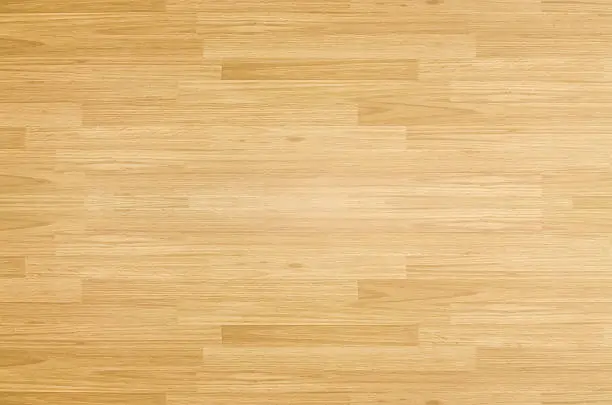 Photo of Hardwood maple basketball court floor viewed from above