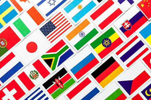 Photo of Background of different colorful national flags of the world. Collage
