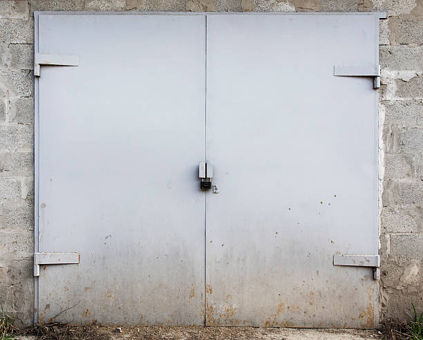 istock old metal warehouse door 577966332