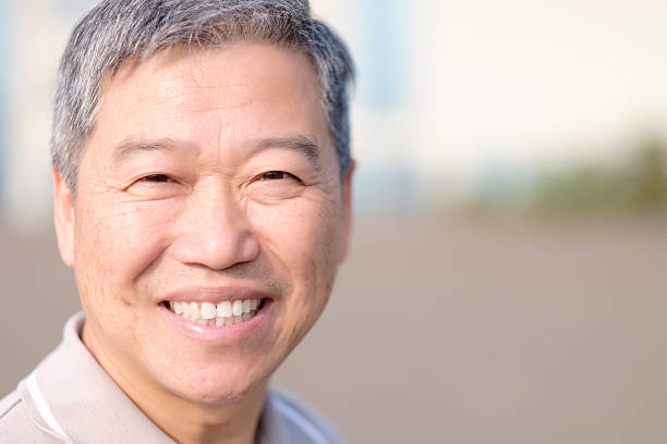 istock old man smile to you 577966504
