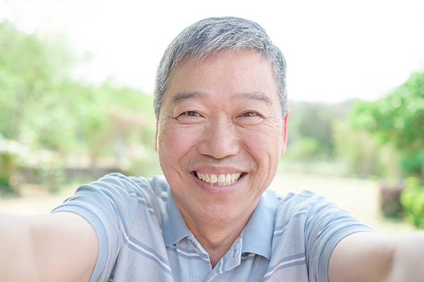 istock man selfie by smart phone 577966592