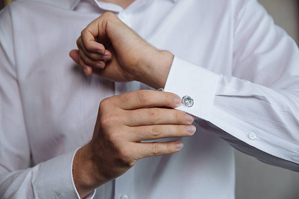 istock Businessman hands with cufflinks. Elegant gentleman clother 577967368