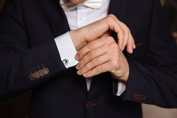 istock Businessman hands with cufflinks. Elegant gentleman clother 577967436