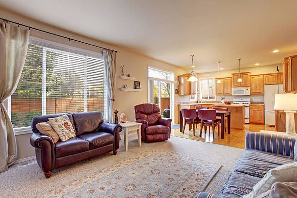 istock Cozy living room interior with deep brown leather sofa 577968370