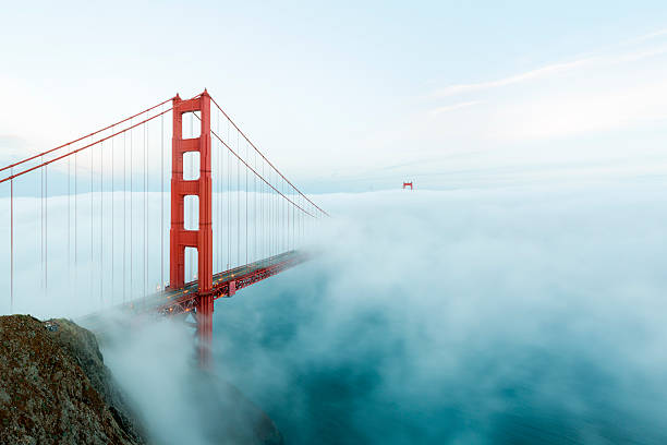 famous Golden Gate Bridge with low fog, San Francisco, USA