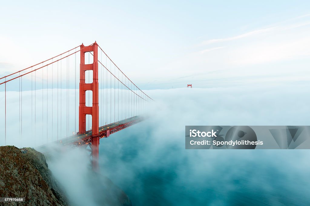 Golden Gate Bridge with low fog, San Francisco famous Golden Gate Bridge with low fog, San Francisco, USA Golden Gate Bridge Stock Photo