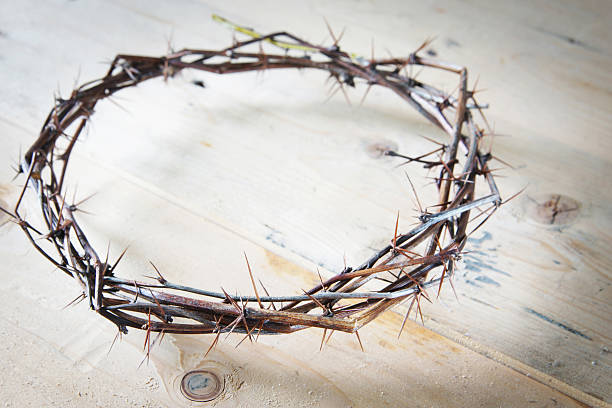 istock Crown of Thorns on wooden surface 577971570