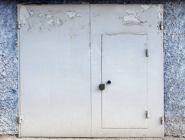 istock old metal warehouse door 577971862
