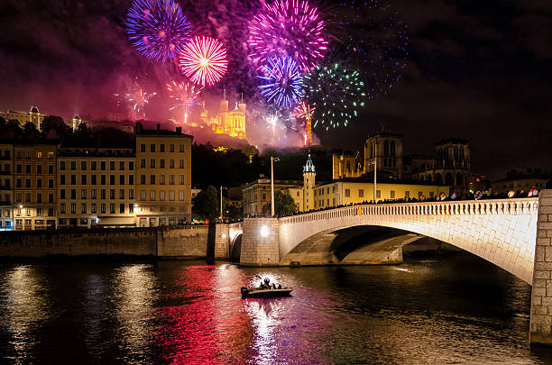 Lyon (France) fireworks for the National Holiday (14 July 2016) Lyon (France) fireworks on Notre-Dame de Fourviere for the National Holiday (14 July 2016) bastille day photos stock pictures, royalty-free photos & images