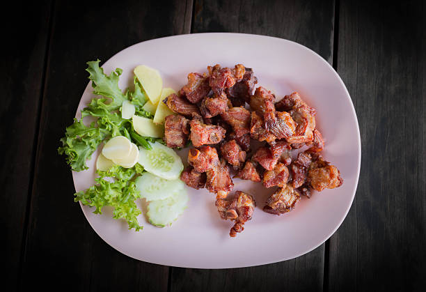 top view juicy fried pork ribs on plate