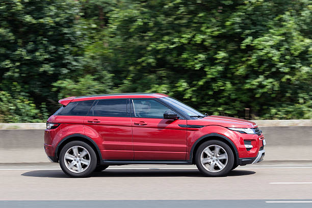 Range Rover Evoque on the road Frankfurt, Germany - July 12, 2016: Range Rover Evoque on the highway in Germany evoque stock pictures, royalty-free photos & images